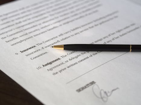 pexels photo 261679 261679 Close-up image of a business contract and pen, signed and ready for agreement.